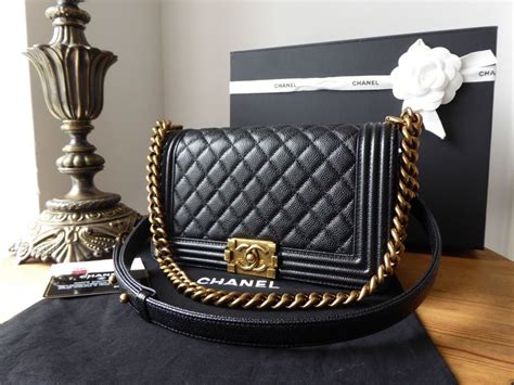 chanel le boy caviar gold hardware|The Ultimate Guide to the Chanel Boy Bag .